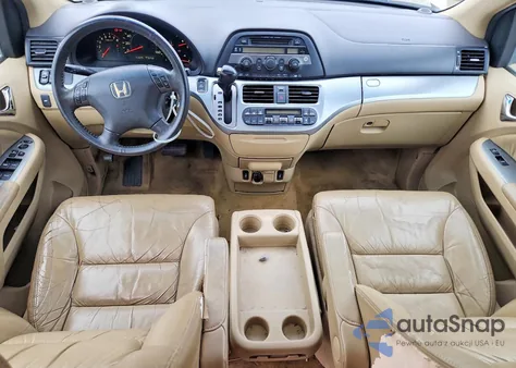 2009 Honda Odyssey Exl z USA, uszkodzony, nr VIN 5FNRL386X9B410926